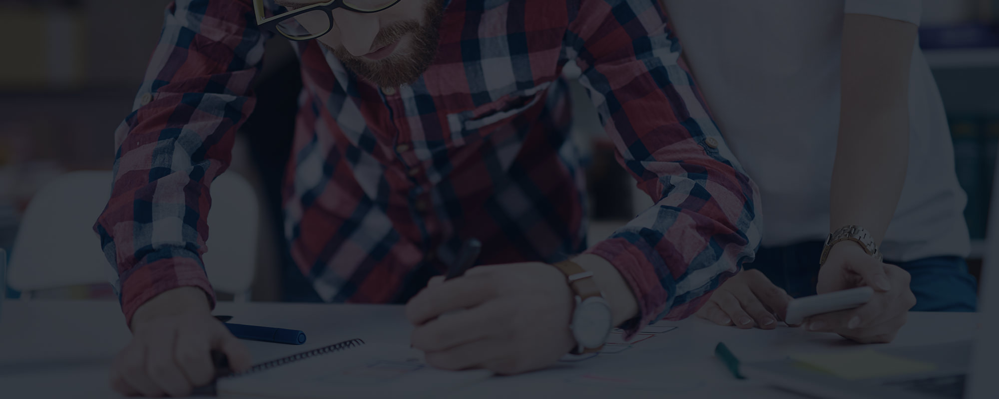 Person Designing on Paper 1